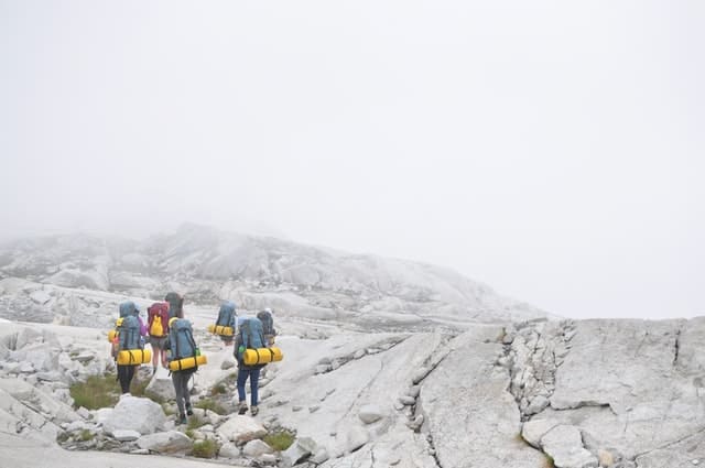 hikers hiking in winter